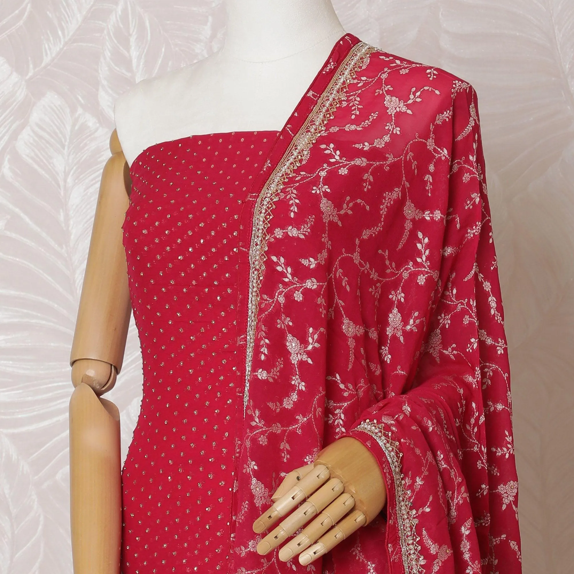 Fuchsia pink Premium pure silk georgette kameez with gold bead work and embroidery having stone work in floral design. Fuchsia pink plain salwar having same tone georgette jacquard dupatta-D14993